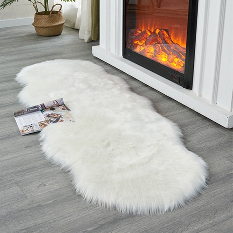 White shaggy sheepskin rug or chair mat