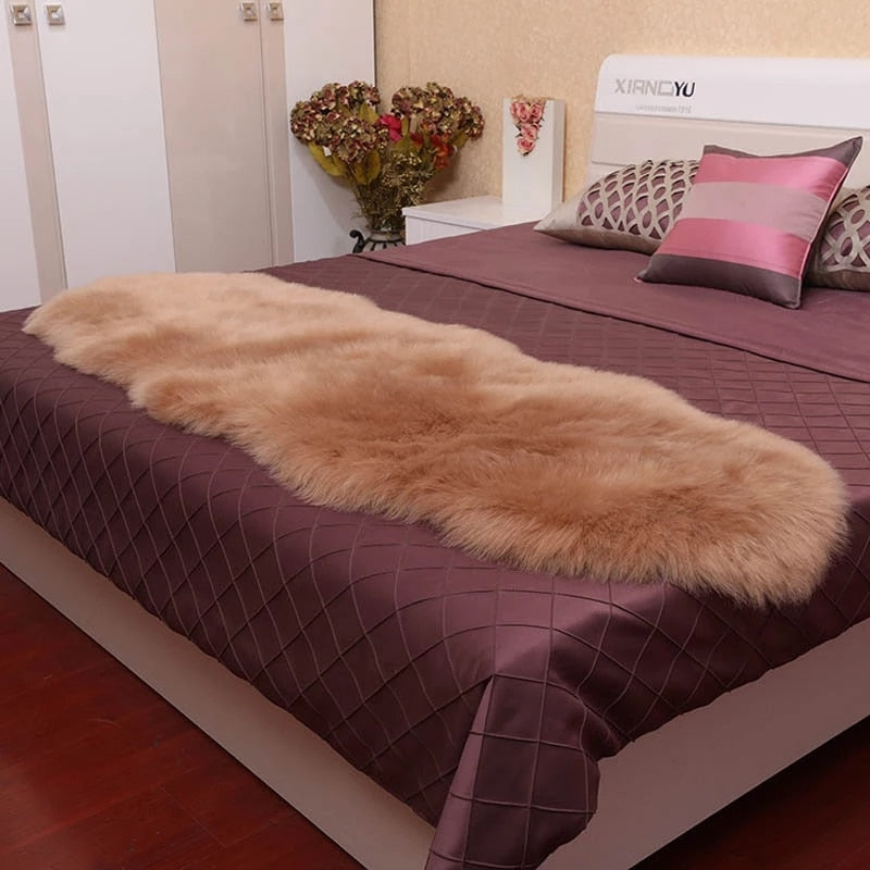 Soft camel coloured sheepskin style floor rug