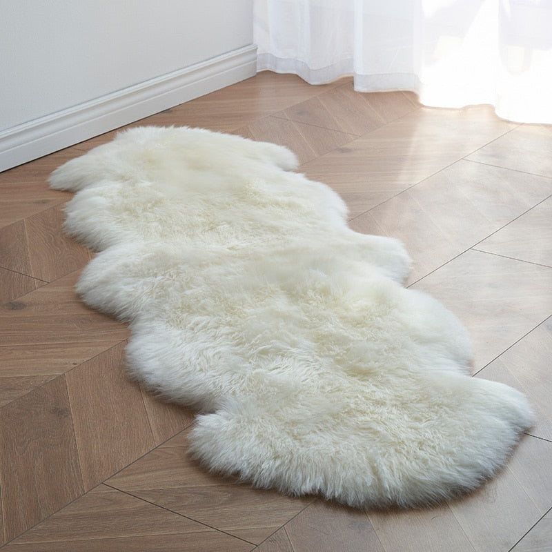 White shaggy sheepskin rug or chair mat